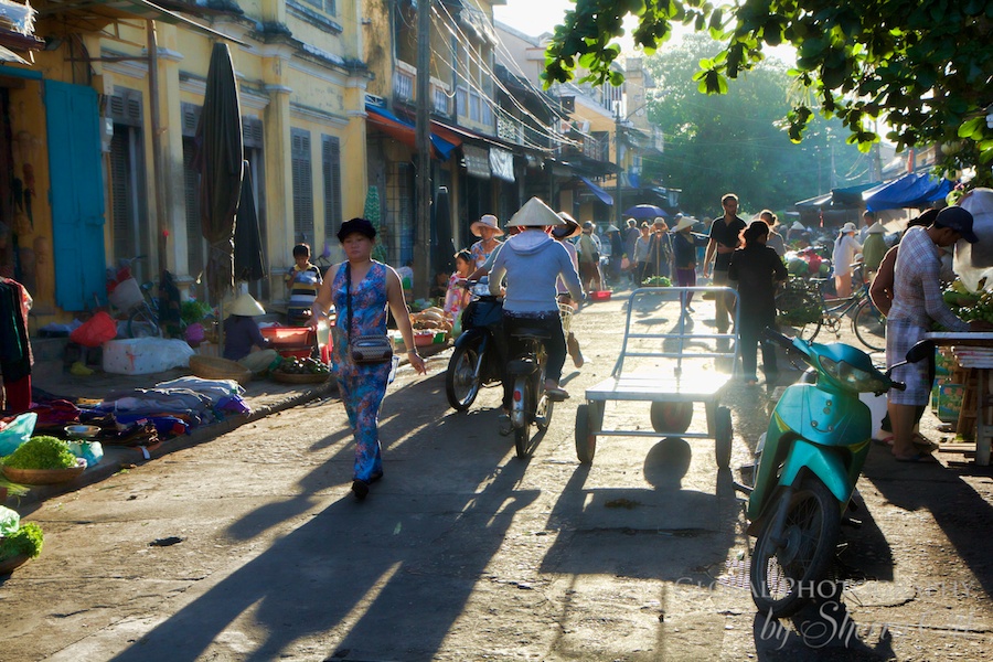Long shadows are cast in the early morning market in Hoi An Photo credit: ottsworld
